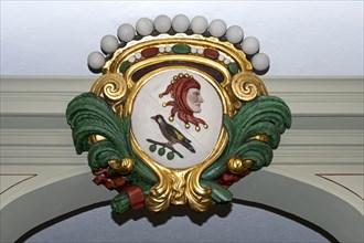 Double coat of arms of the L'Abbaye des Gentilshommes at the entrance of the society's house in the historic town centre of Bern
