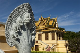 Sculpture of a seven-headed Naga snake in front of the Royal Hor Samran Phirun pavilion on the grounds of the Royal Palace
