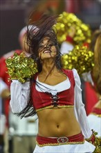 Cheerleader of the 49ers dances during the NFL International game between the San Francisco 49ers and the Denver Broncos on October 31