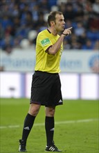 Referee Marco Fritz gesturing