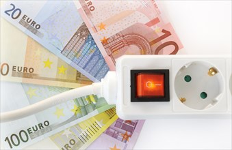 Power outlet strip with euro banknotes