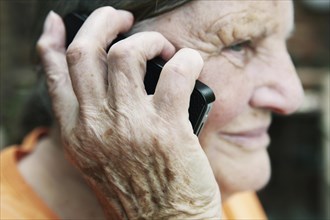 Elderly woman using a smartphone