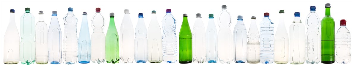 Different varieties of mineral water in bottles made of glass and plastic or PET