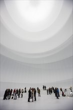 Visitors within an installation by Christo