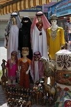 Mannequins wearing traditional Arabic clothing for sale