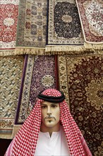 Male mannequin wearing an Arab headscarf