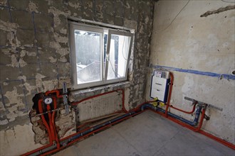 New plumbing lines in an old bathroom