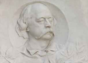 Marble relief of the writer Gustave Flaubert