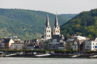 Rhine River waterfront with St. Severus Church