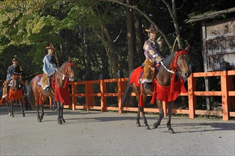 Final procession of archers on horseback