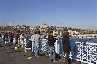 Anglers standing on the Galata Bridge