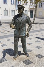 Bronze statue of a lottery vendor