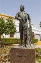 Sculpture of toreador Curro Romero near Plaza de toros de la Real Maestranza de Caballeria de Sevilla