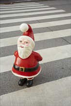 Santa Claus figure on zebra crossing