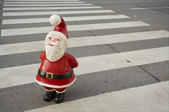 Santa Claus figure on zebra crossing