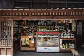 Shop sells various bottles of sake