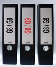 Three file folders labeled 'G8 - G9'