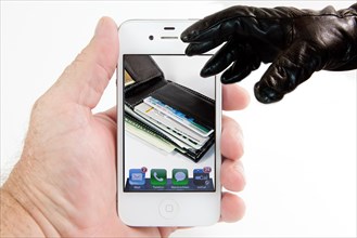Gloved hand reaching for wallet on smartphone display