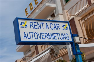 Sign of a car rental business in Port de Soller
