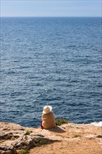 A woman looking out to the sea