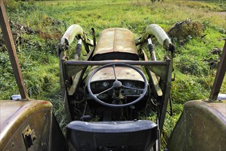 Old Fendt tractor from 1969 on a meadow