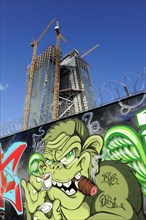 Graffiti in front of the construction site of the new ECB