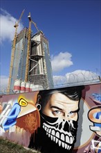 Graffiti in front of the construction site of the new ECB