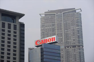 Skyscrapers and a Canon logo