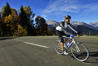 Cyclist riding along the Obersalzbergstrasse
