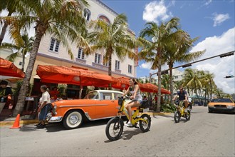 Couple riding electric bicycles