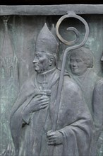 Relief of a bishop on the equestrian monument in Heumarkt square