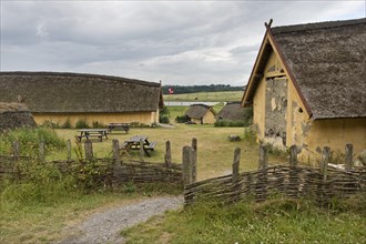 Reconstructed farm with nine houses of a large-scale farmer from the Viking Age