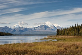 A view of Mt Denali and Mt Hunter in the Alaska Range from Swan Lake