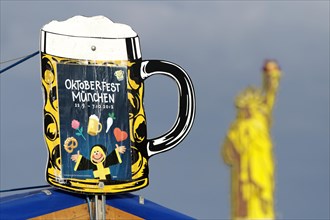 Oktoberfest beer advertisement with imitation of the Statue of Liberty
