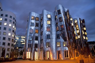 A building by American architect Frank O. Gehry at night