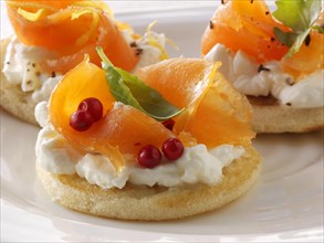 Smoked salmon and cream cheese blini canapes