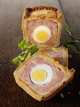 Traditional pork pie with an egg in the middle