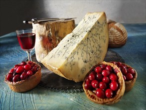 Traditional blue Stilton cheese with cranberry pork pie