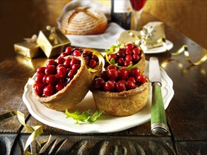 Traditional cranberry topped pork pies