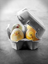 Hand-painted eggs with Easter chicks design
