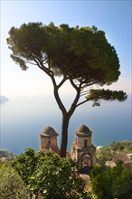 The bell towers of Our Lady of The Annunciation church viewed from Villa Ravello