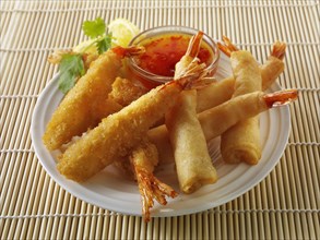 Oriental selection with bread coated and battered prawns with a chilli dipping sauce