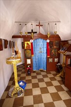 Interior of one of the 365 Greek Orthodox Chapels of Ios with religious icons