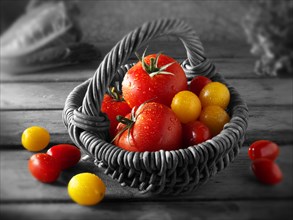 Mixed tomatoes in a basket