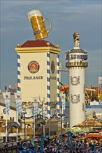 Towers of the marquees of Paulaner Breweries and Lowenbraeu at the Wies'n