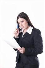 Businesswoman holding a pen and a letter