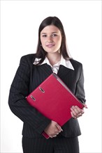 Businesswoman holding a red folder