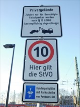 Signs at a parking-access