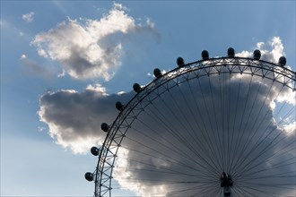 London Eye ferris wheel with clouds