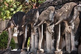 Elephant statues at the base of the Chedi